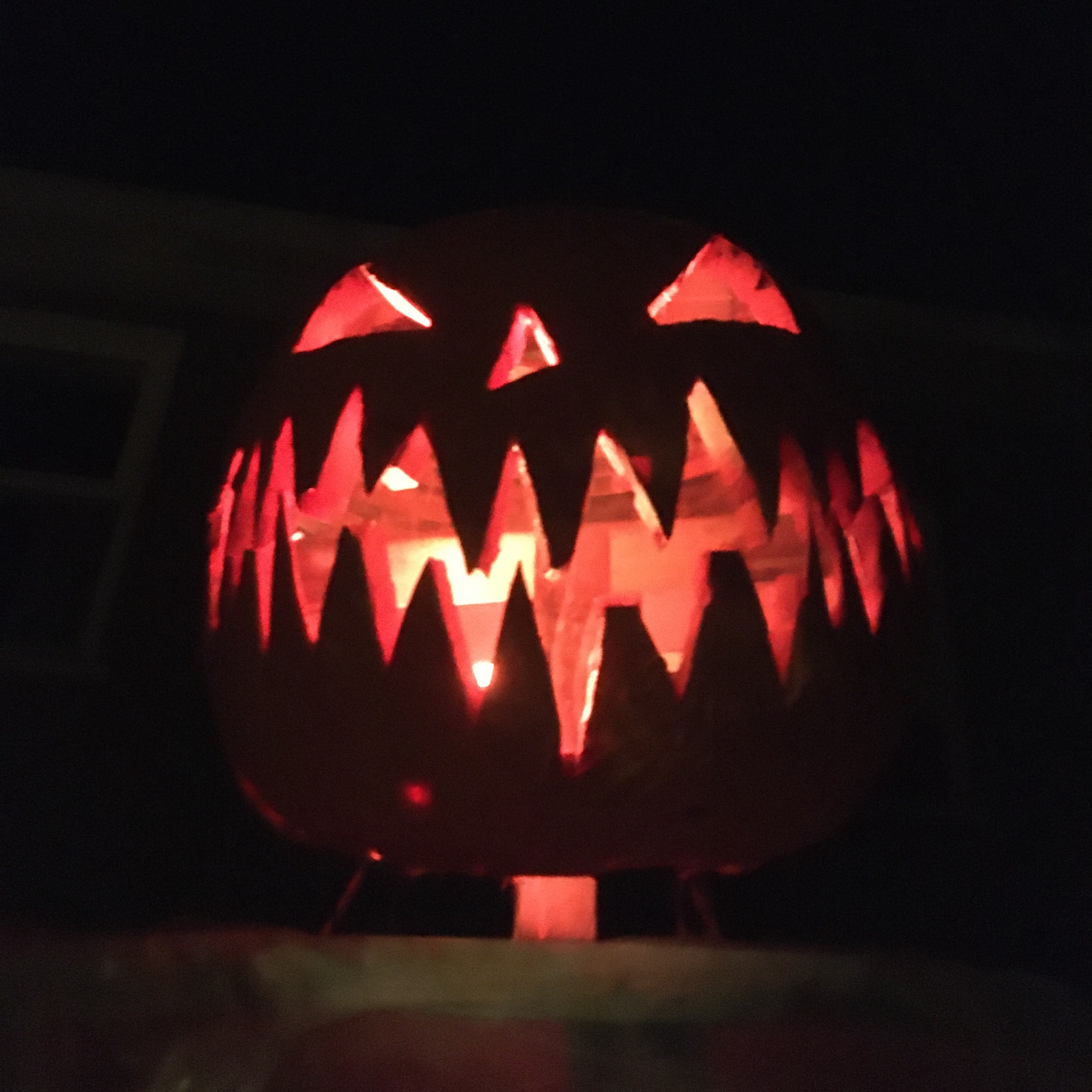 Pumpkin Man's glowing Jack-o-lantern head
